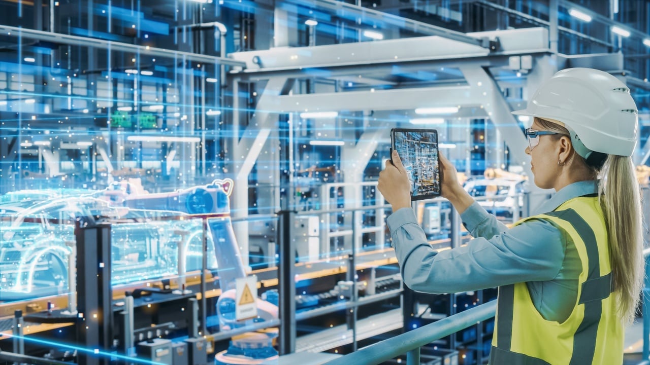 woman using software in manufacturing